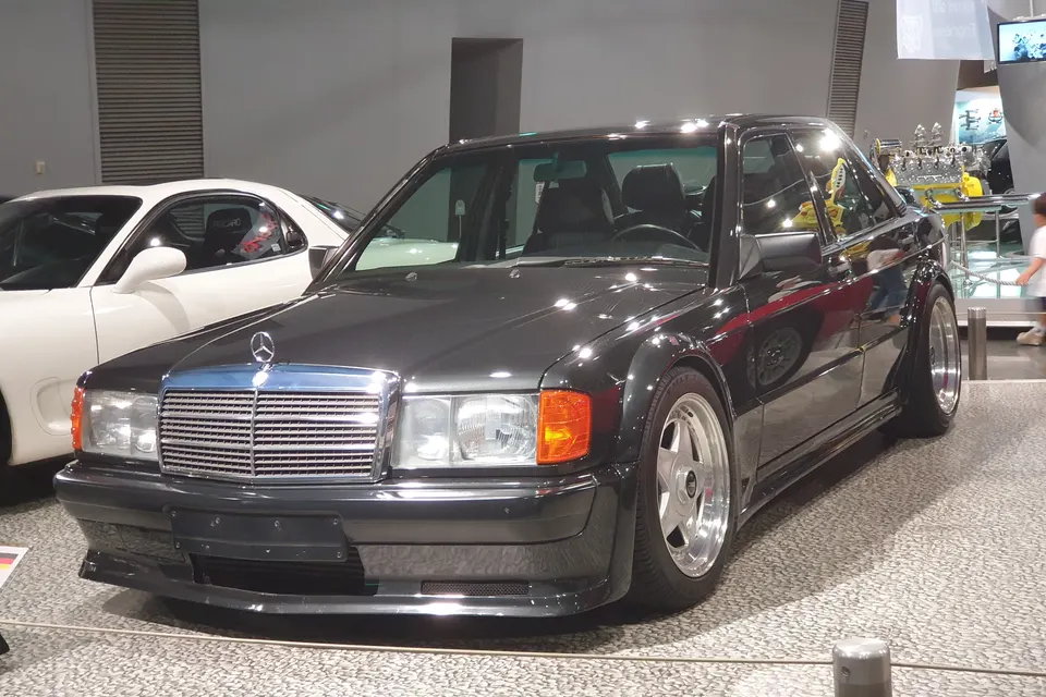 Grey Mercedes-Benz 190 E 2.5-16 Evolution I displayed indoors