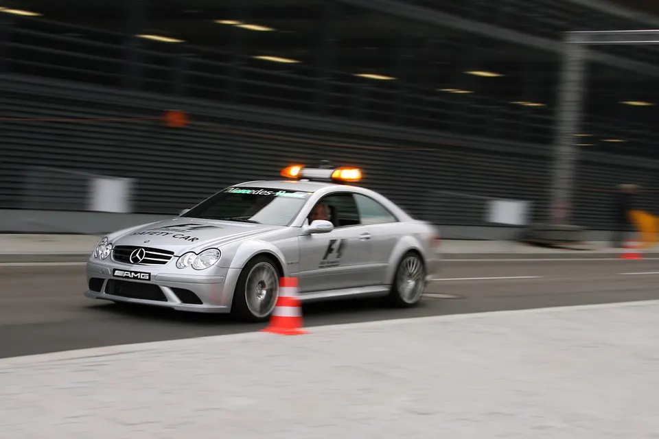 Silver Mercedes-Benz CLK 63 AMG Formula 1 safety car on track
