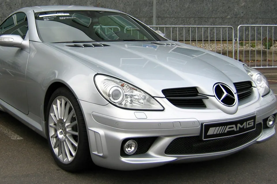Silver second-generation Mercedes-Benz SLK 55 AMG R171, front three-quarter view