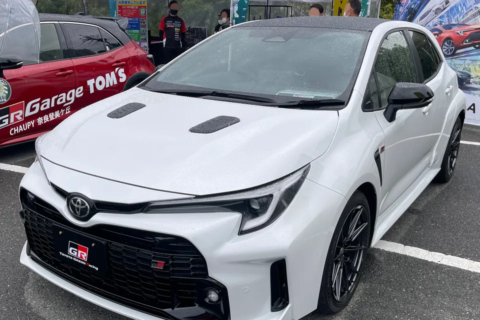 White Toyota GR Corolla RZ hatchback, front three-quarter view