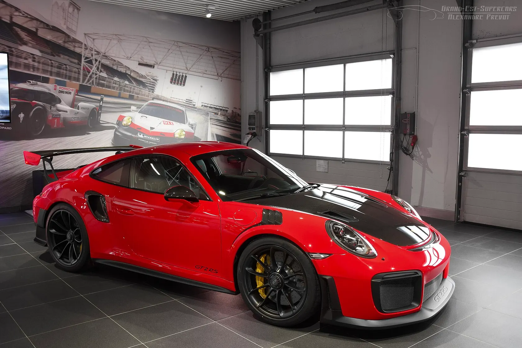 Red Porsche 911 GT2 RS Type 991.2, front three-quarter view
