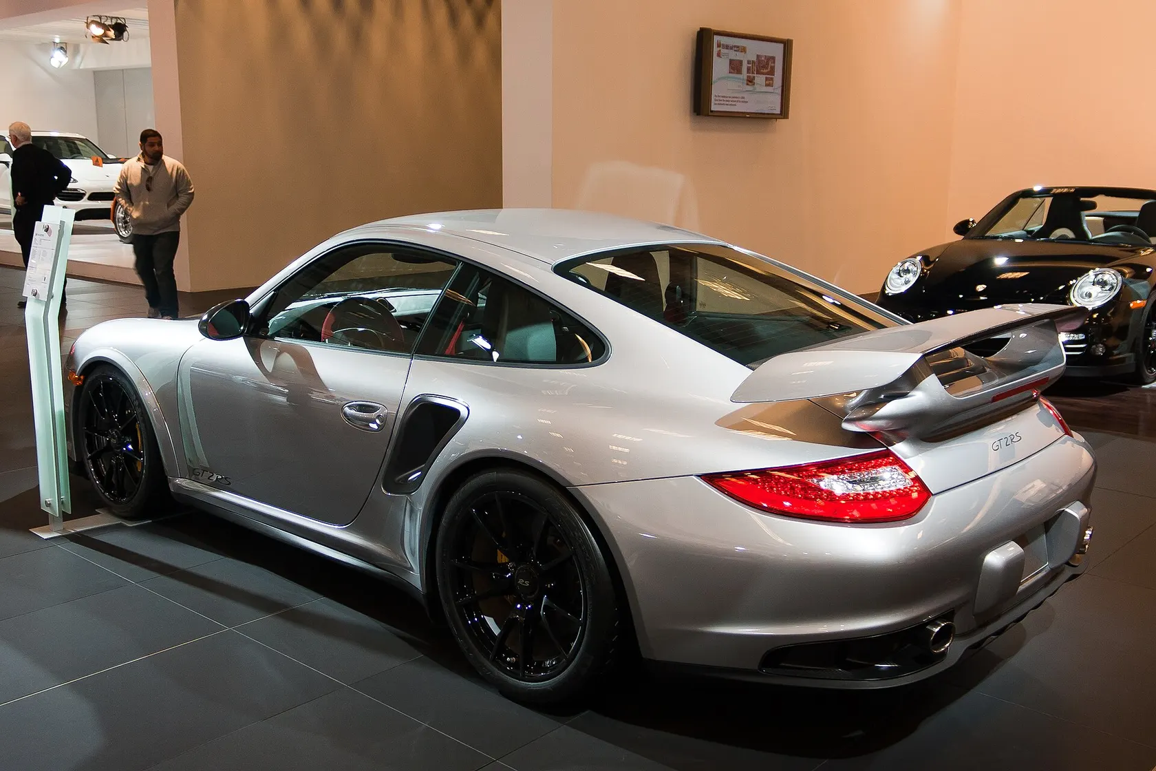 Silver and red Porsche 911 GT2 RS Type 997.2, front three-quarter view