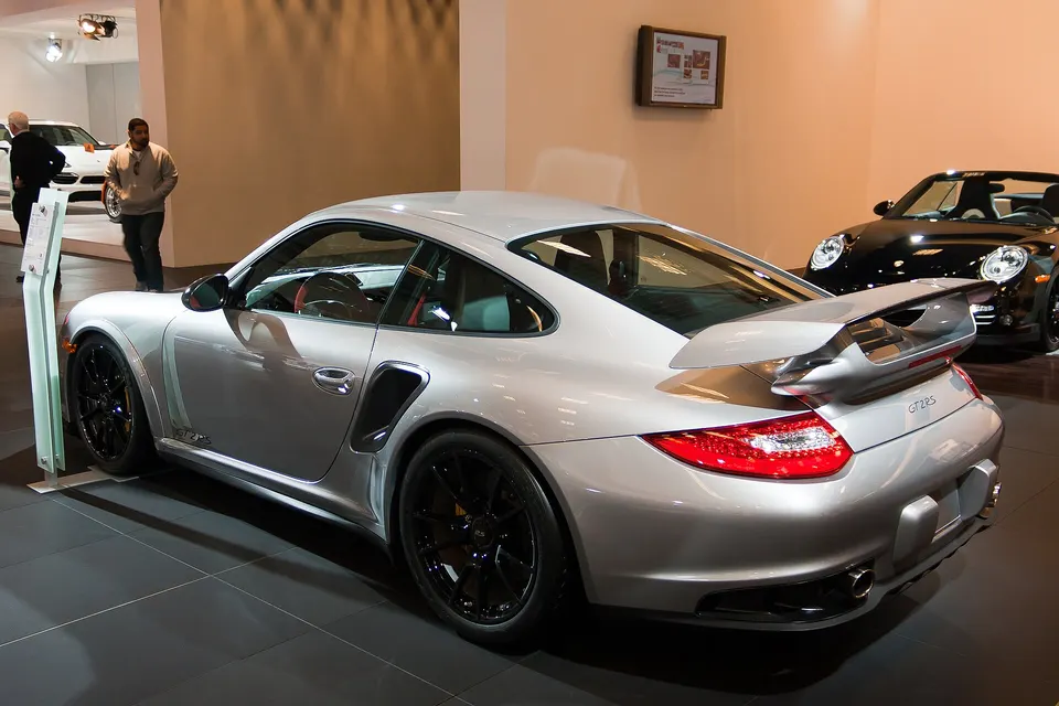 Silver and red Porsche 911 GT2 RS Type 997.2, front three-quarter view
