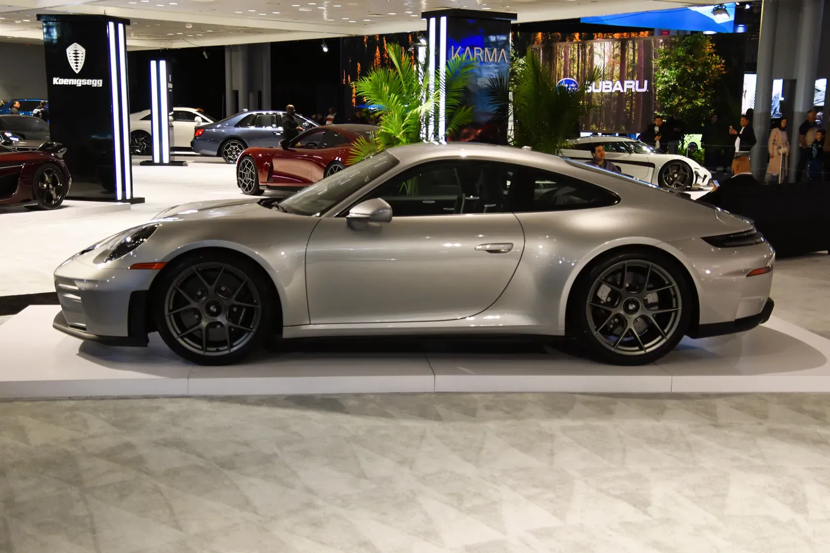 Silver Porsche 911 GT3 with Touring Package Type 992.2 photographed in profile at the 2026 New York International Auto Show