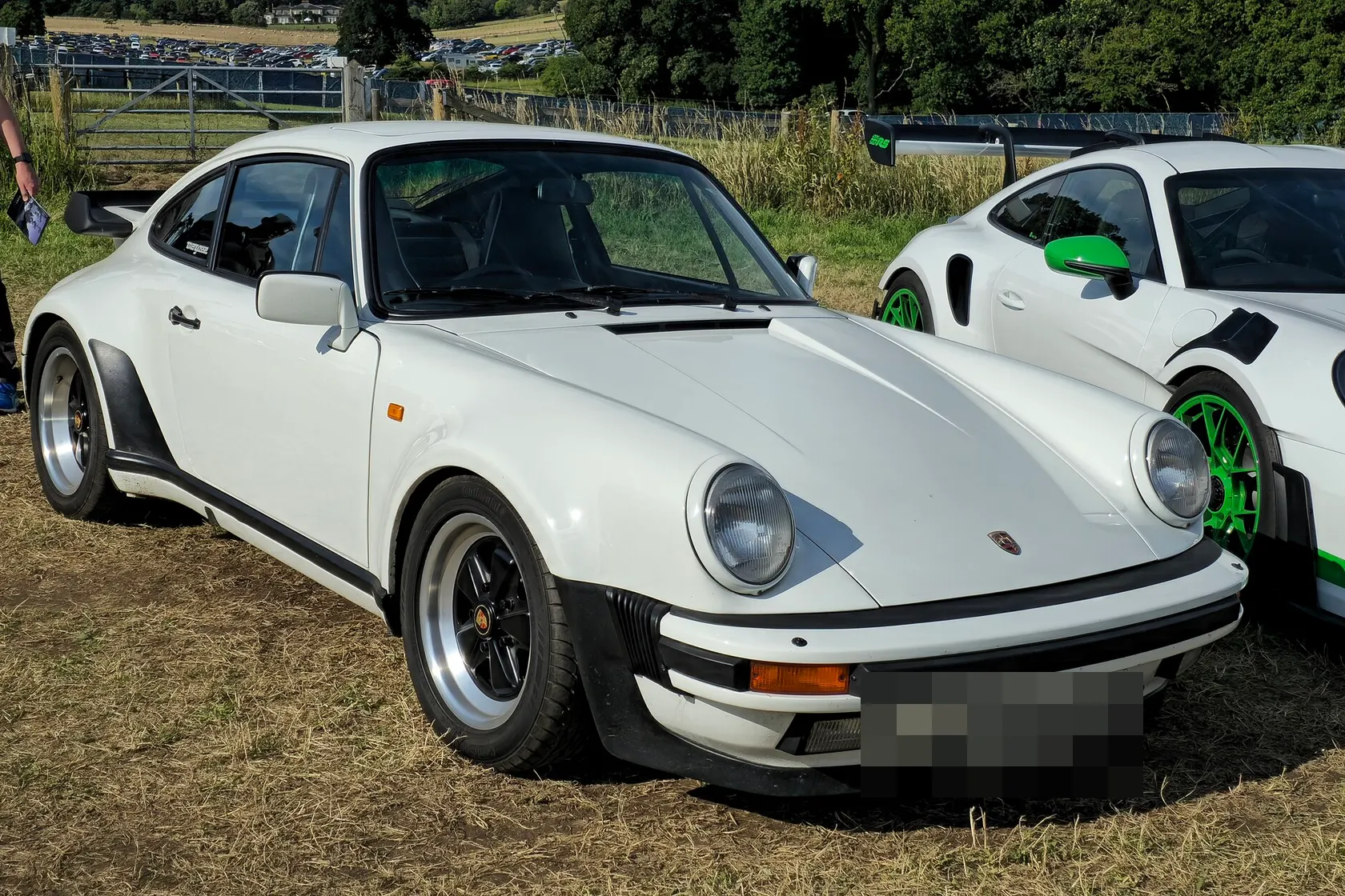 White Porsche 911 Turbo 3.3 Type 930, front three-quarter view