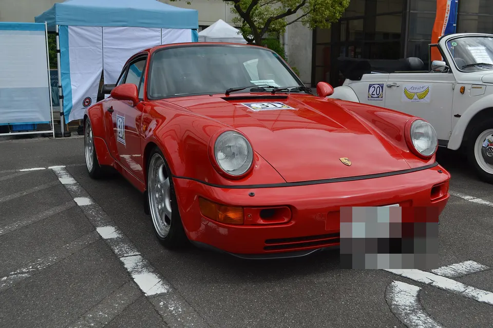 Red Porsche 911 Turbo 3.6 Type 964, front three-quarter view