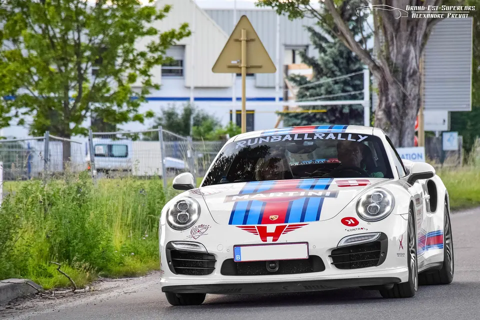 Black Porsche 911 Turbo S Type 991.1, front three-quarter view