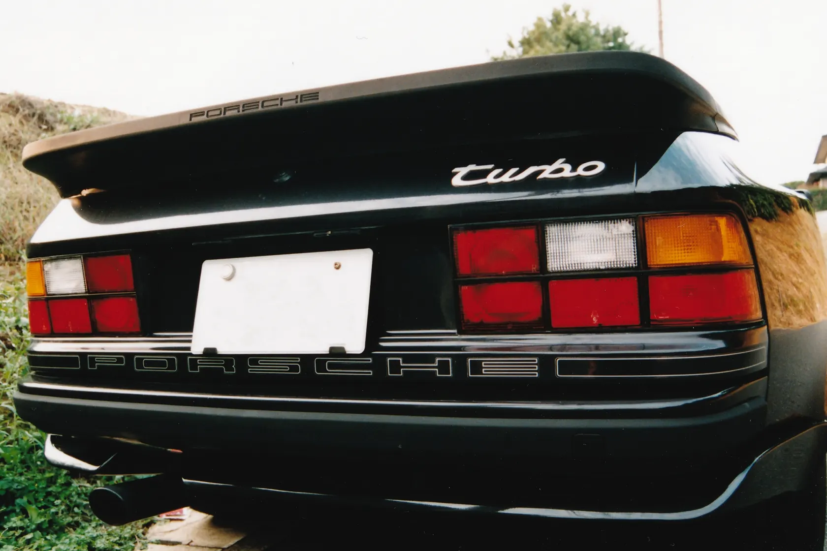 Burgundy 1988 Porsche 944 Turbo S, rear three-quarter view