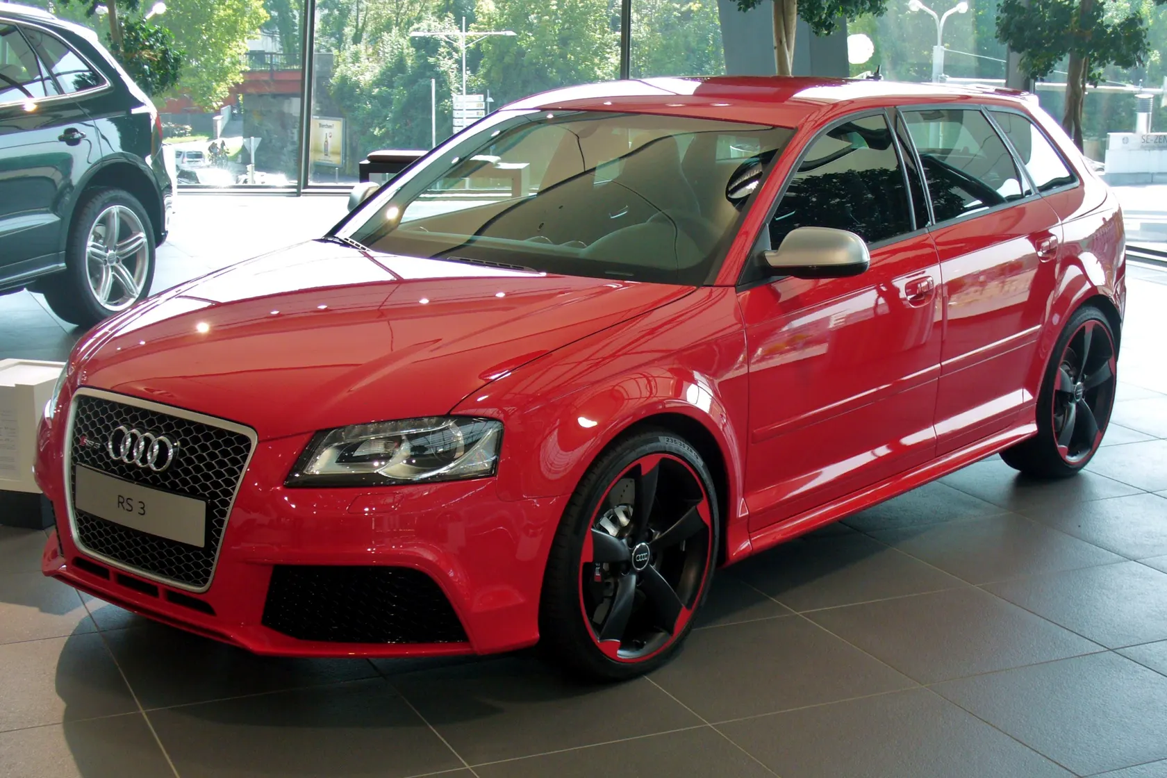 Red first-generation Audi RS 3 Sportback in front three-quarter view
