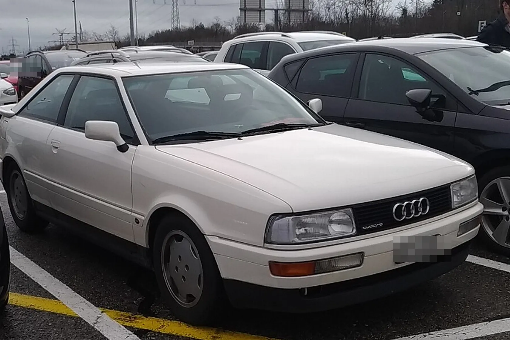 Red Audi S2 Coupé in front three-quarter view