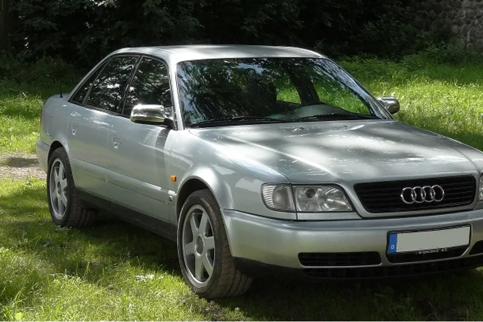 Blue Audi S6 plus C4 saloon in side profile