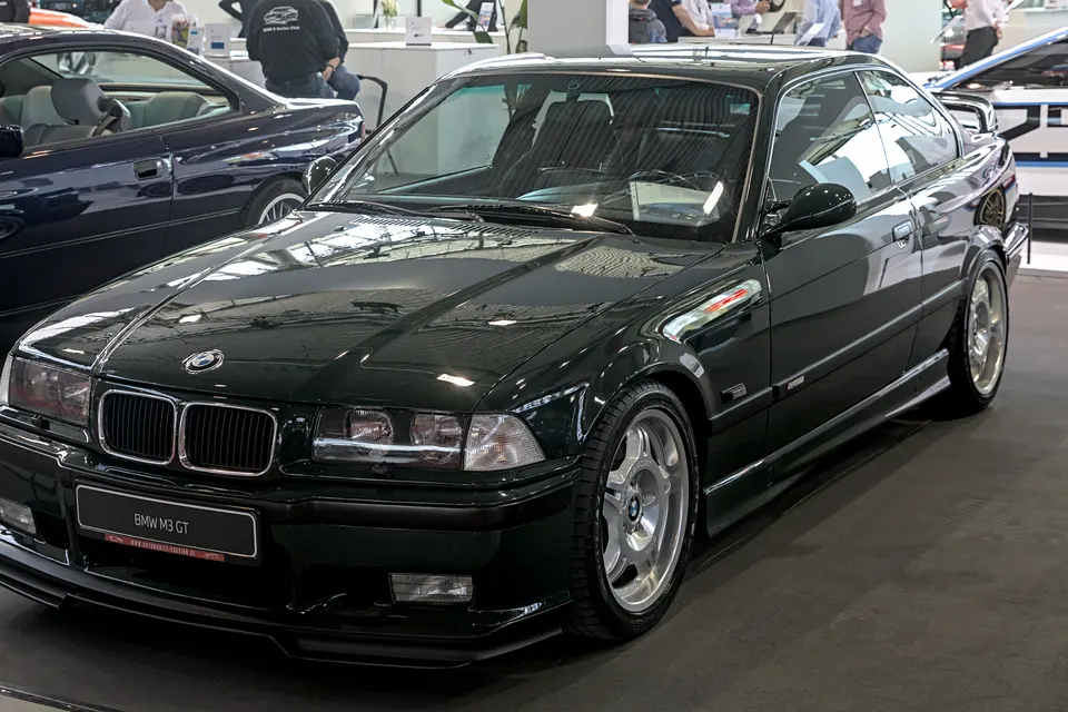 British Racing Green BMW M3 GT E36 at a classic car exhibition