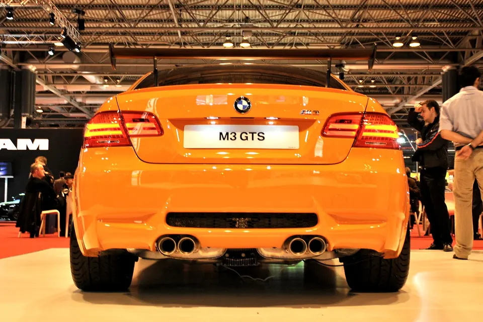 Fire Orange BMW M3 GTS E92 displayed from the rear
