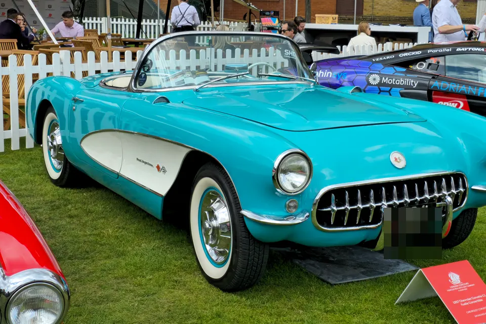 Turquoise and white 1957 Chevrolet Corvette C1 Fuelie in front three-quarter view