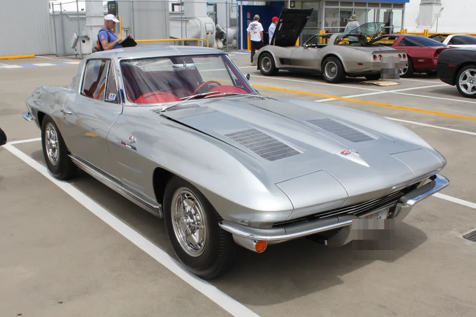 Silver 1963 Chevrolet Corvette Sting Ray Z06 in front three-quarter view