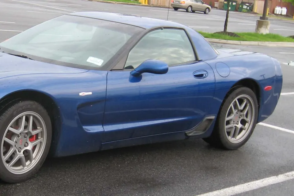 Blue Chevrolet Corvette C5 Z06 in side profile
