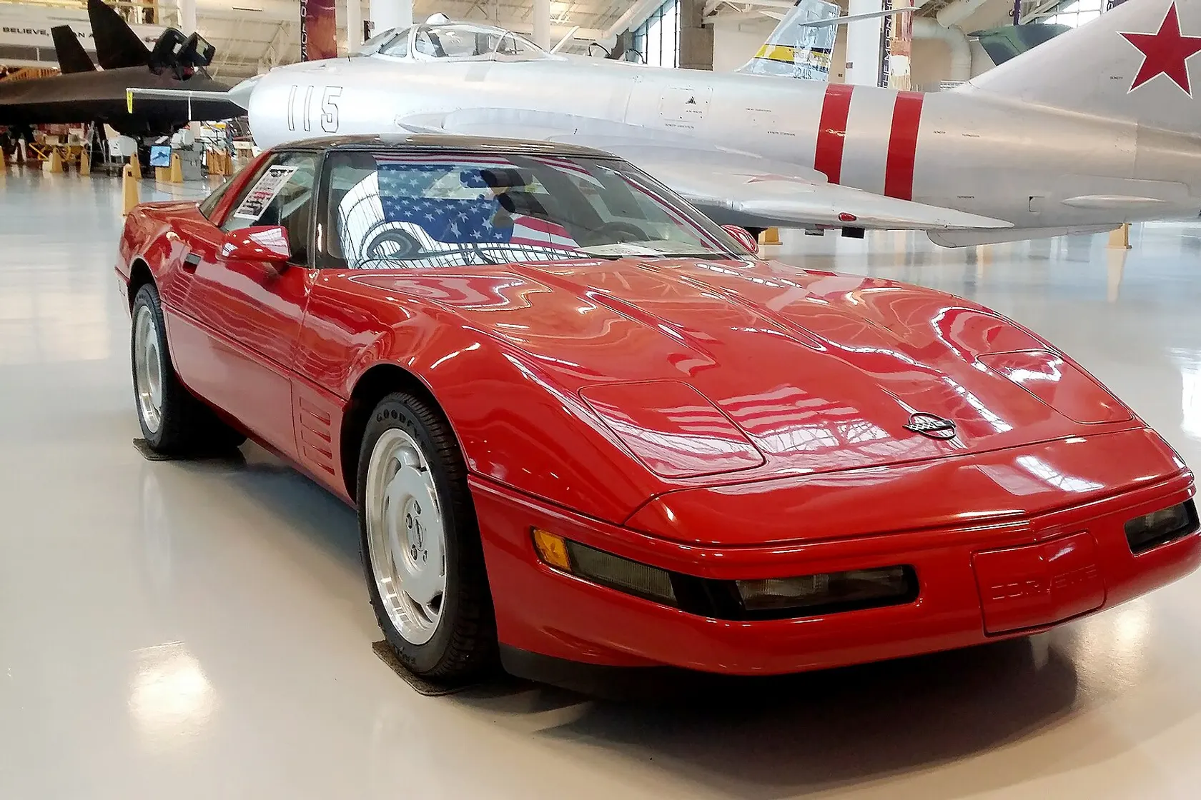 Red 1990 Chevrolet Corvette ZR-1 in front three-quarter view
