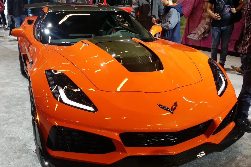 Orange 2019 Chevrolet Corvette C7 ZR1 at an indoor motor show