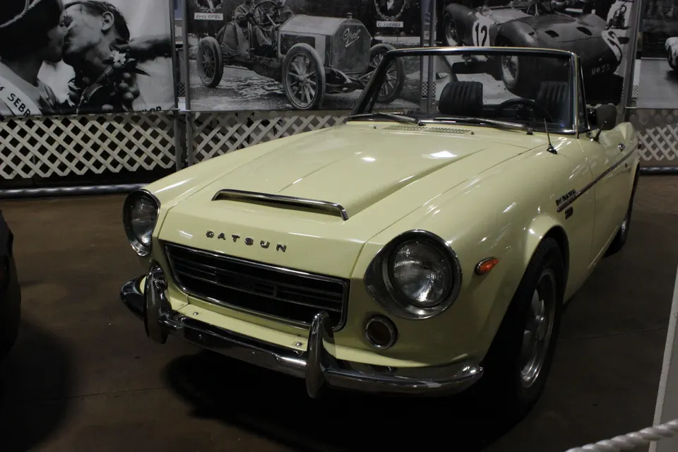 Red Datsun 2000 Roadster in front three-quarter view