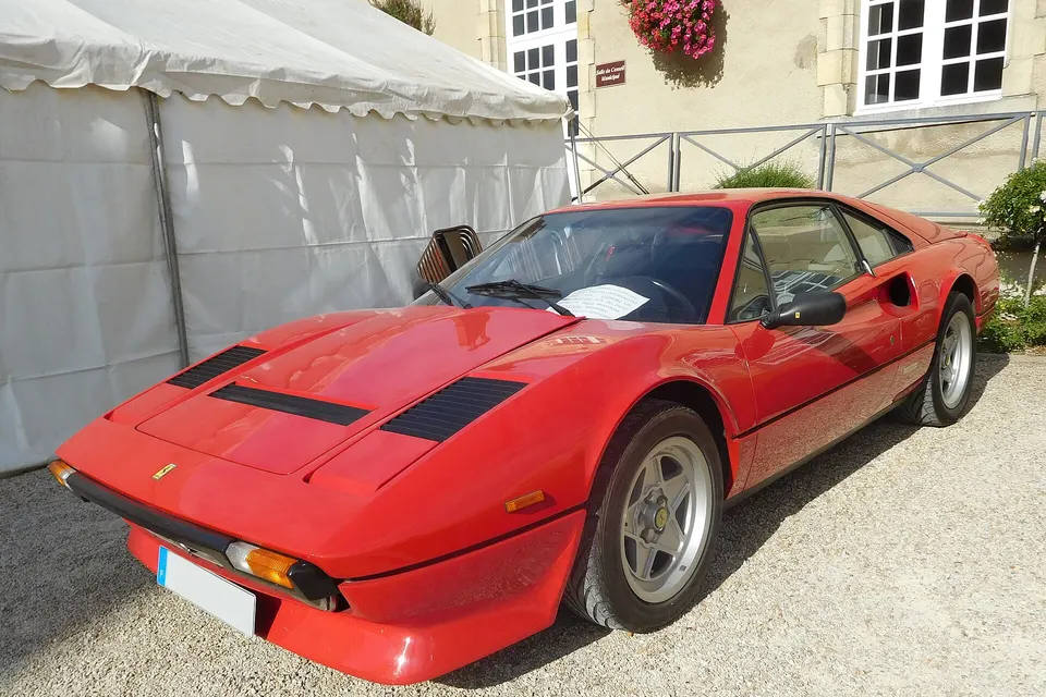 Red 1984 Ferrari 308 GTB Quattrovalvole, front three-quarter view