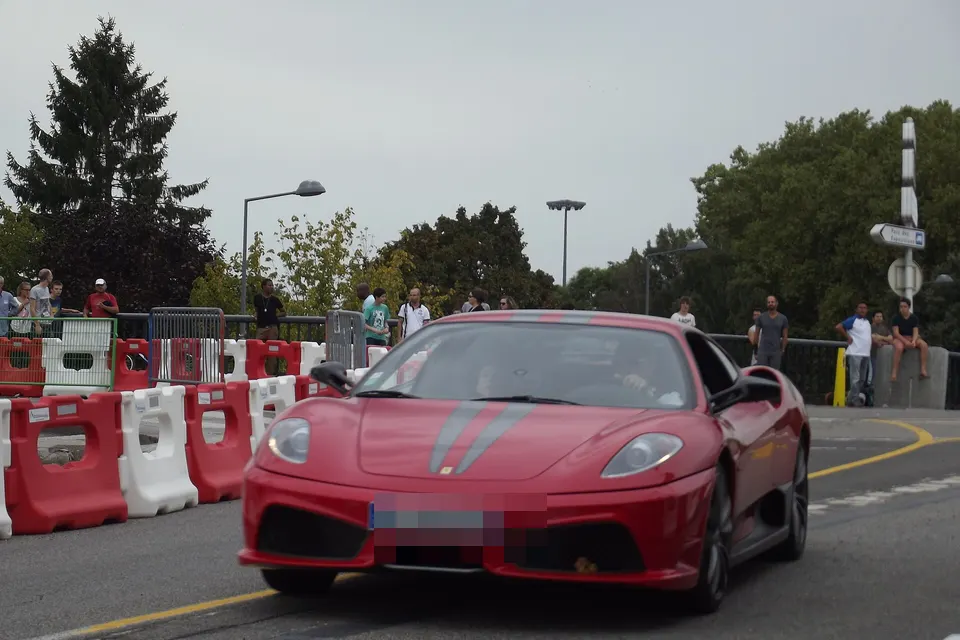 Red Ferrari 430 Scuderia in Toulouse, front three-quarter view