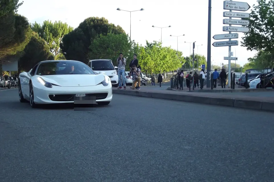 Red Ferrari 458 Italia in Toulouse, front three-quarter view