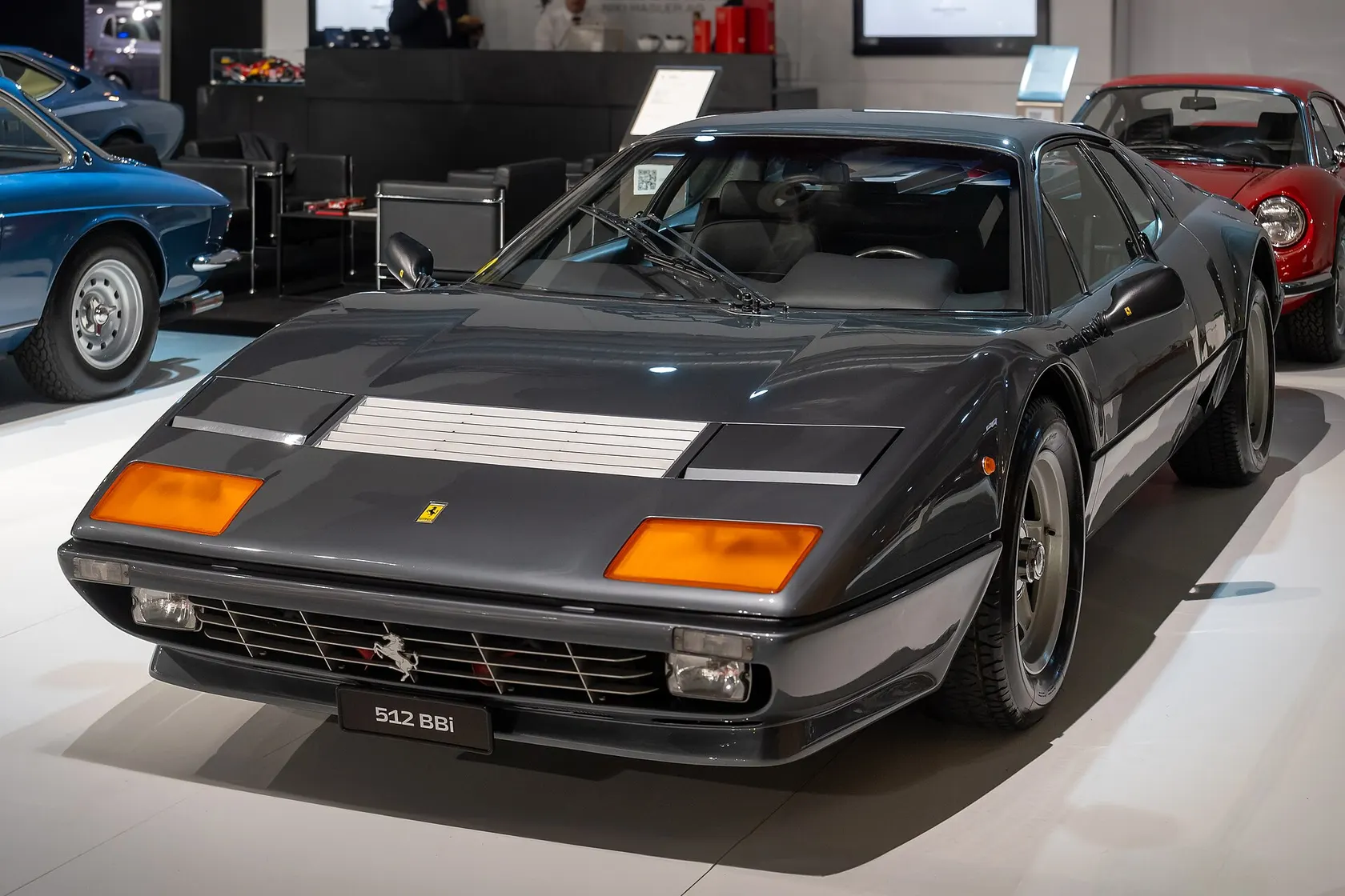 Red Ferrari 512 BBi at Auto Zurich, front three-quarter view