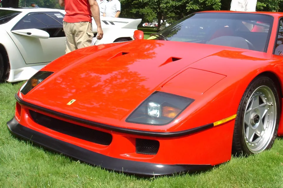 Red Ferrari F40 photographed at an exhibition