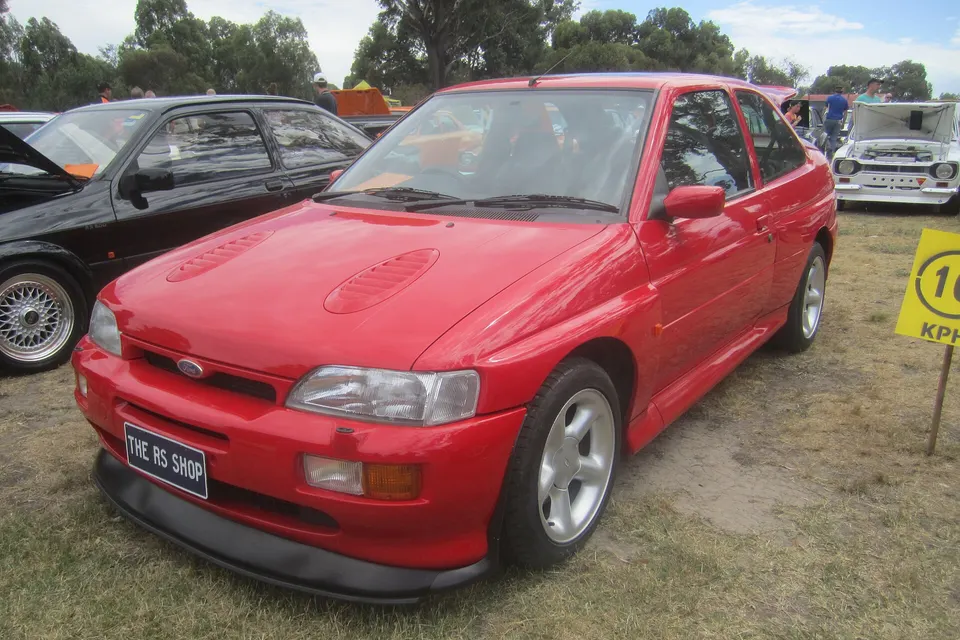 Blue 1992 Ford Escort RS Cosworth in front three-quarter view