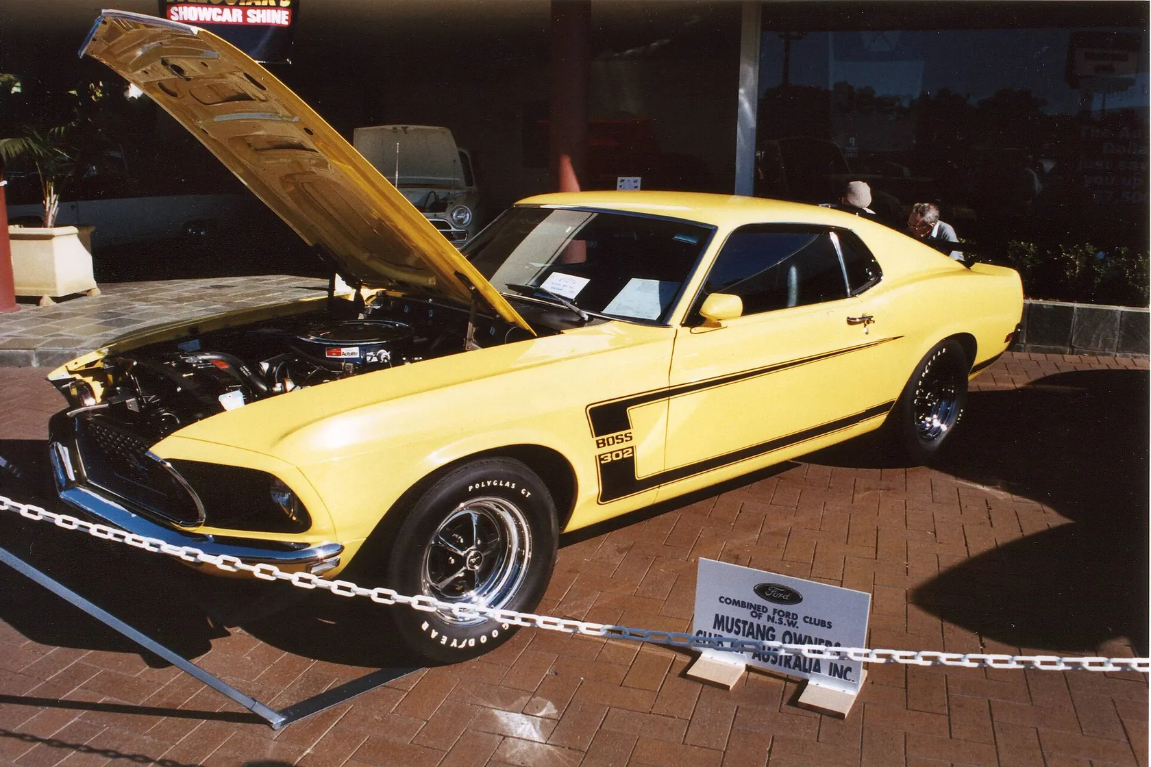 Yellow 1969 Ford Mustang Boss 302 at a Ford show