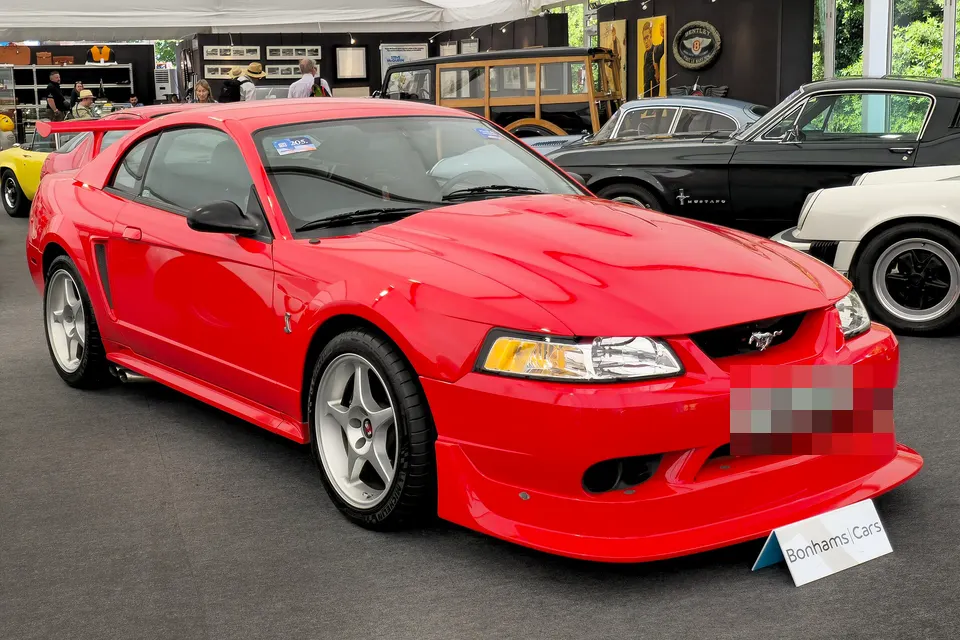 Red 2000 Ford Mustang SVT Cobra R in front three-quarter view