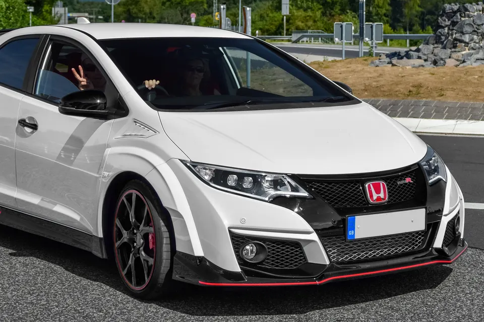White Honda Civic Type R FK2 in front three-quarter view