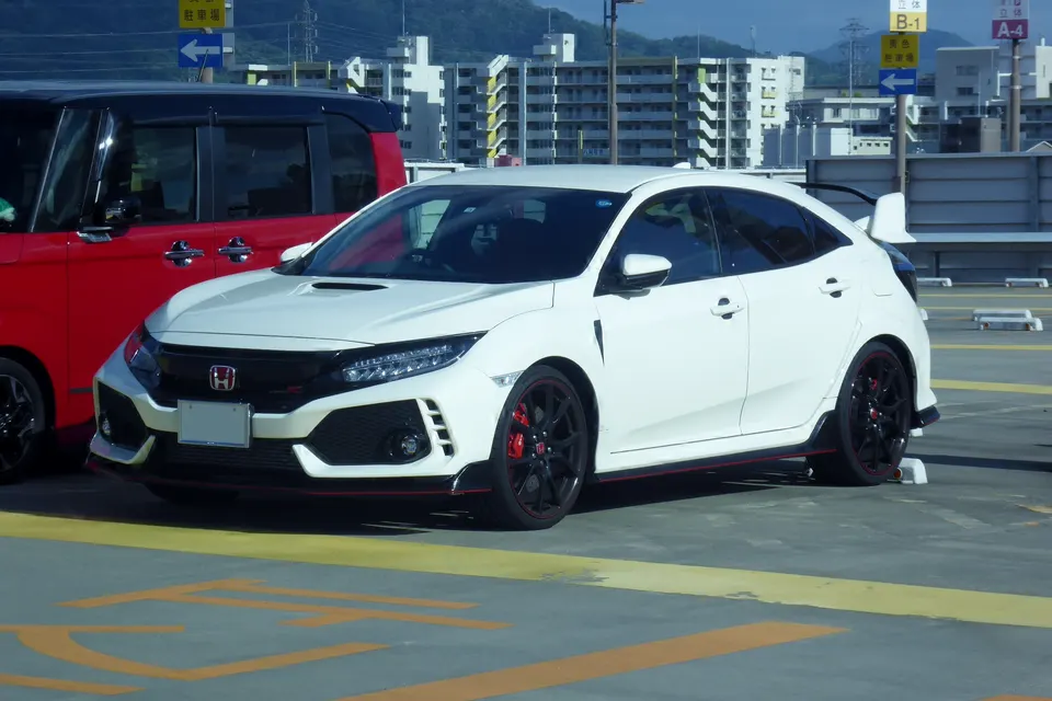 White Honda Civic Type R FK8 in front three-quarter view