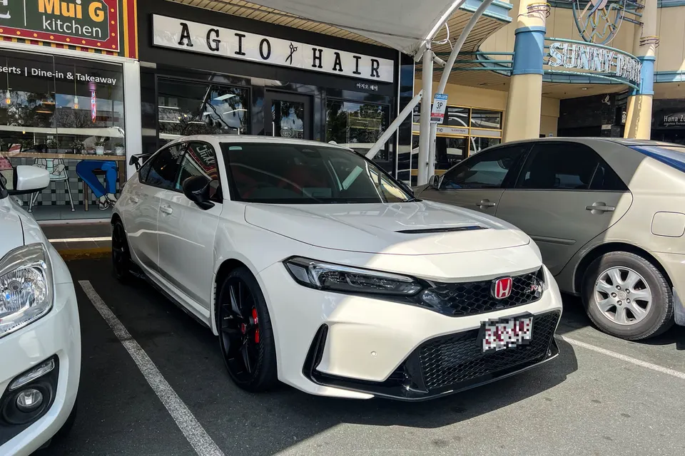 White Honda Civic Type R FL5 in front three-quarter view