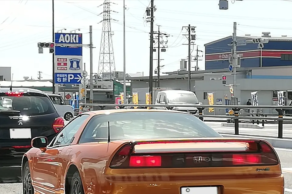 Orange Honda NSX Type S NA2 in rear three-quarter view