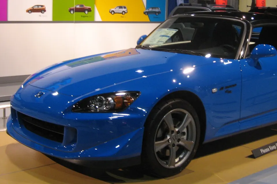 Yellow 2008 Honda S2000 CR in side profile