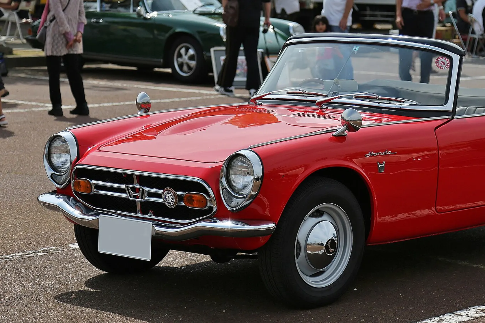 Red 1966 Honda S800 roadster in front three-quarter view