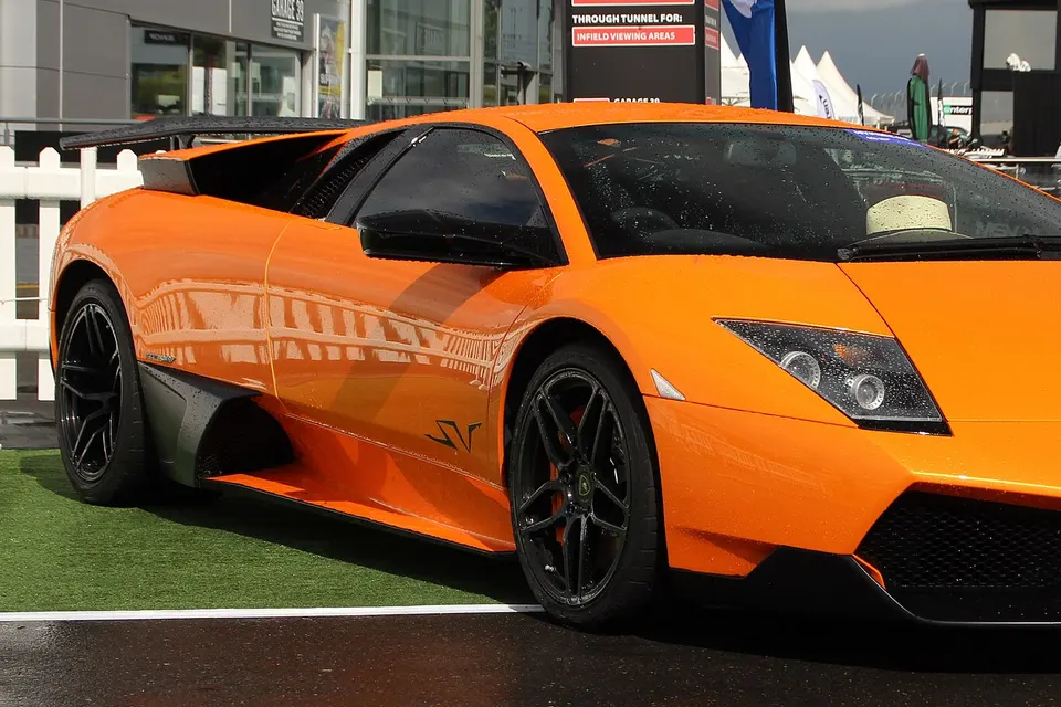 Orange Lamborghini Murciélago LP 670-4 SuperVeloce, front three-quarter view