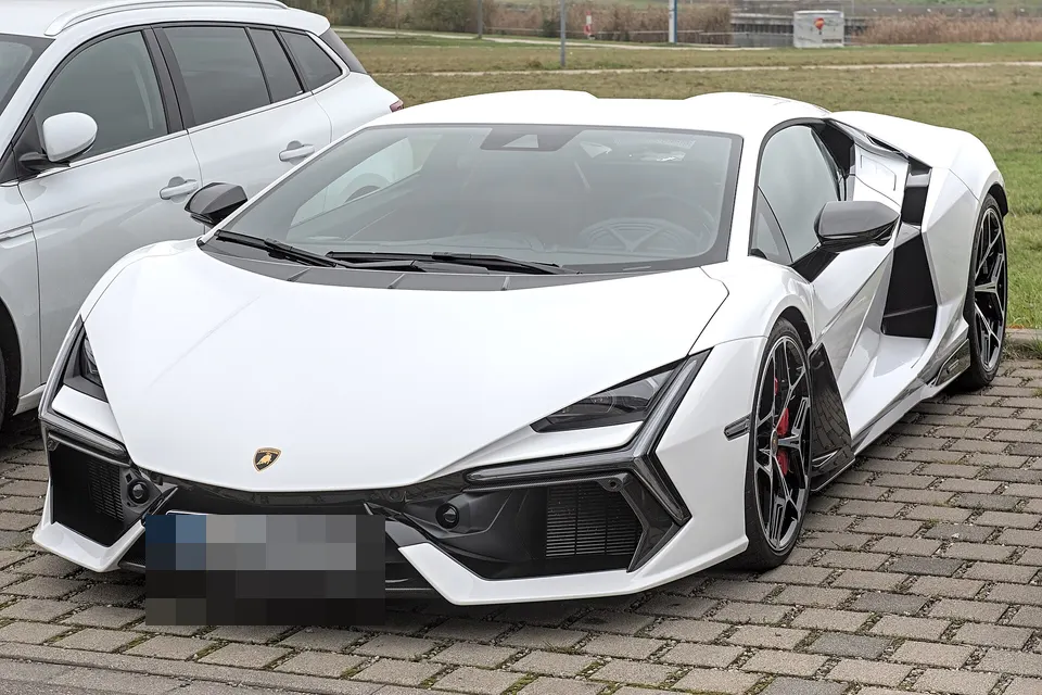 White Lamborghini Revuelto viewed from the front quarter