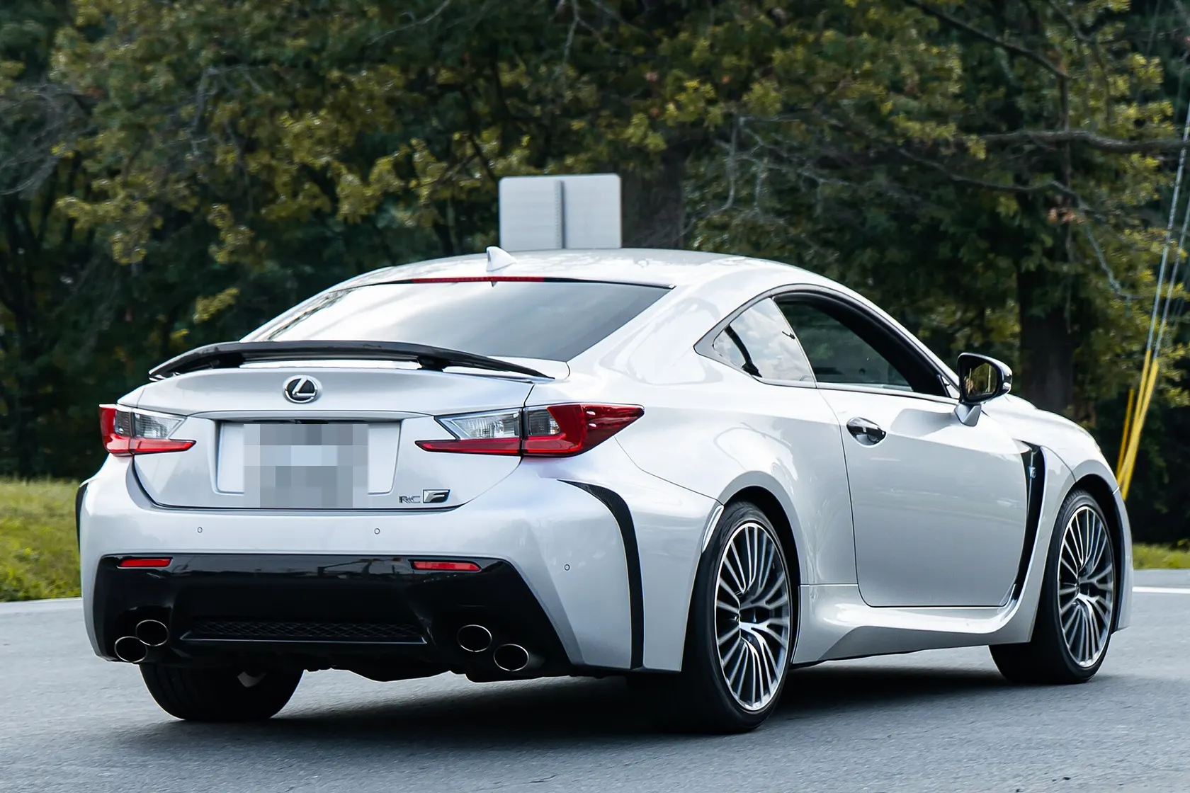 Blue Lexus RC F, rear three-quarter view