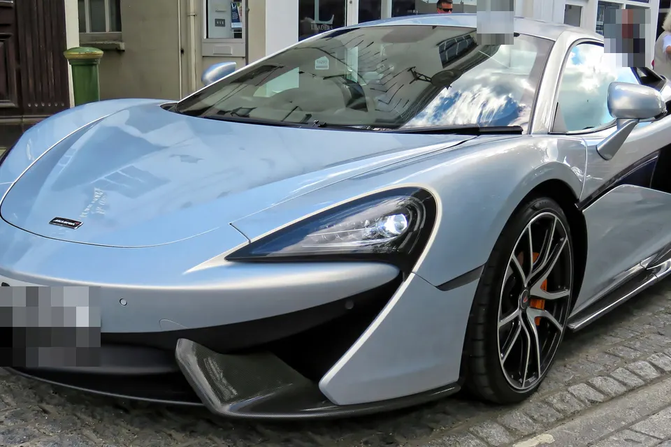 McLaren 570S Coupe at an outdoor event in front three-quarter view