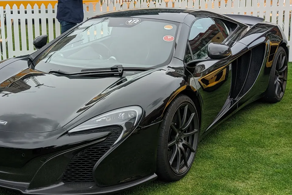 McLaren 650S Coupe at an event in front three-quarter view