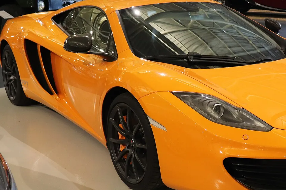 2011 McLaren MP4-12C Coupe in museum front three-quarter view