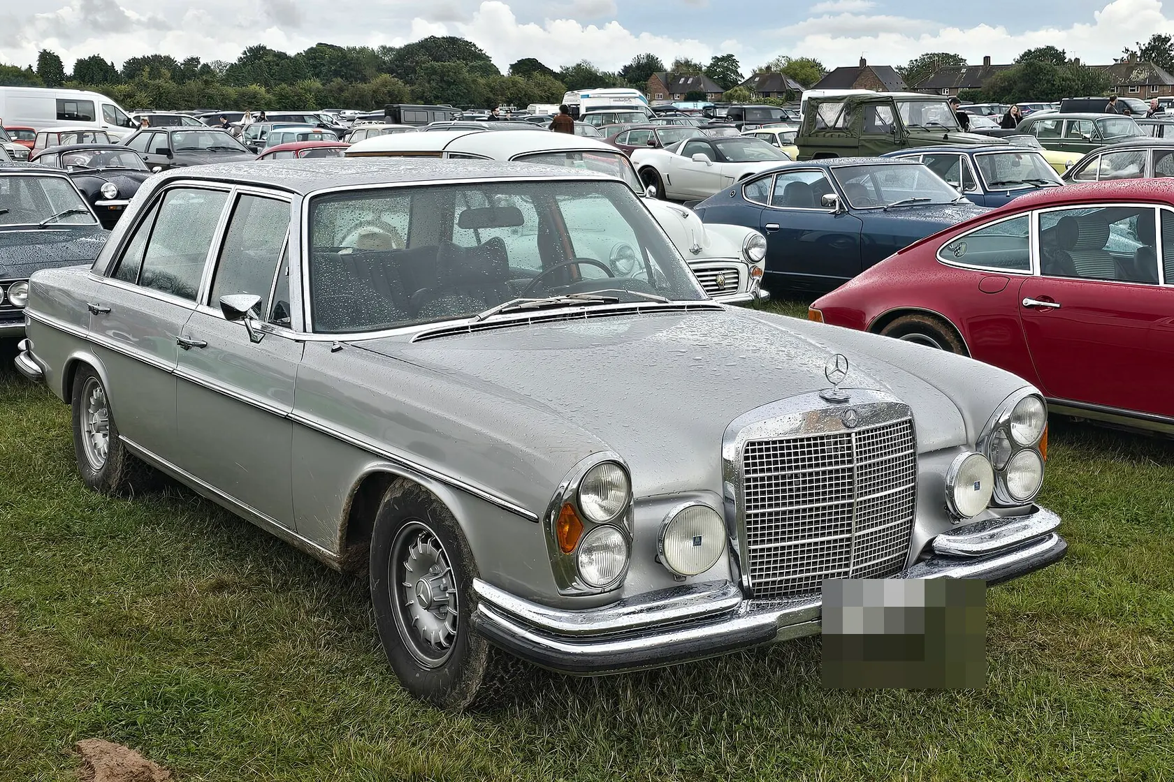 Silver Mercedes-Benz 300 SEL 6.3, front three-quarter view