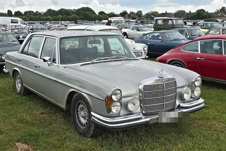 Silver Mercedes-Benz 300 SEL 6.3, front three-quarter view