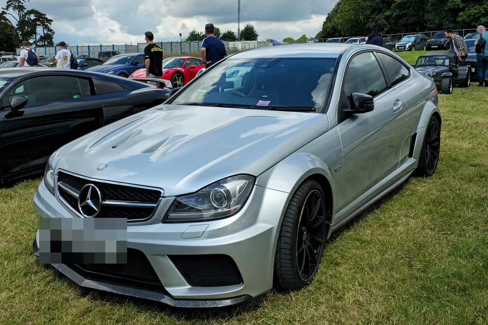 White Mercedes-Benz C 63 AMG Black Series, front three-quarter view