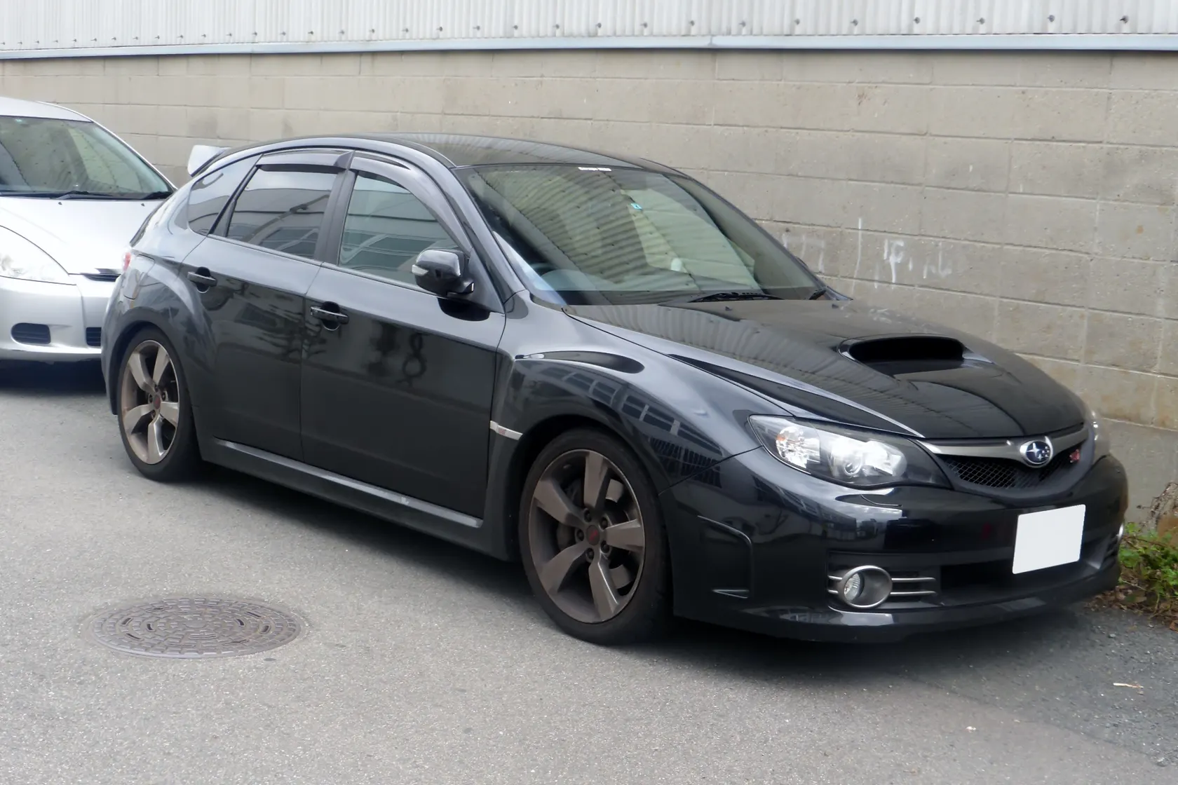 Subaru Impreza WRX STI GRB five-door in front three-quarter view