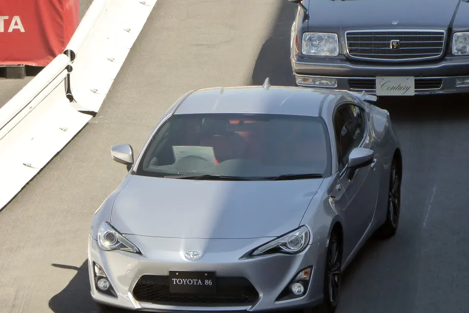 Orange Toyota 86 GT ZN6 from the front three-quarter view