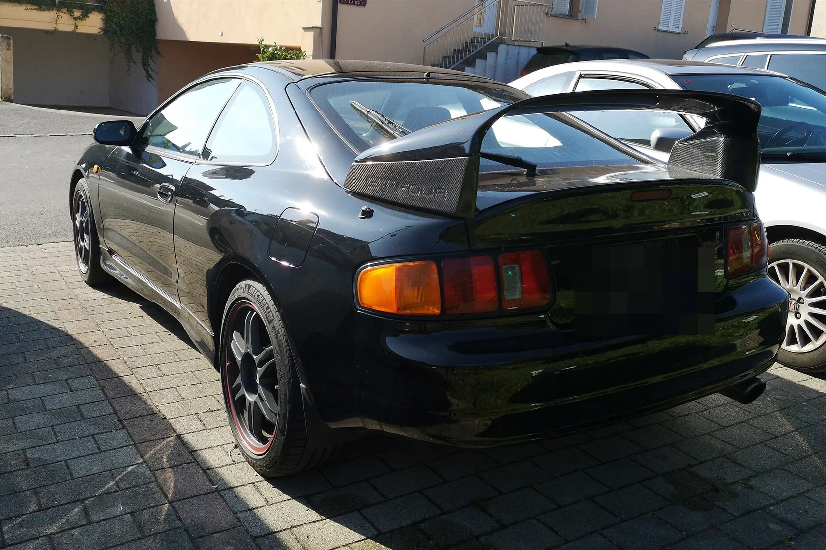 White Toyota Celica GT-Four ST205, rear three-quarter view